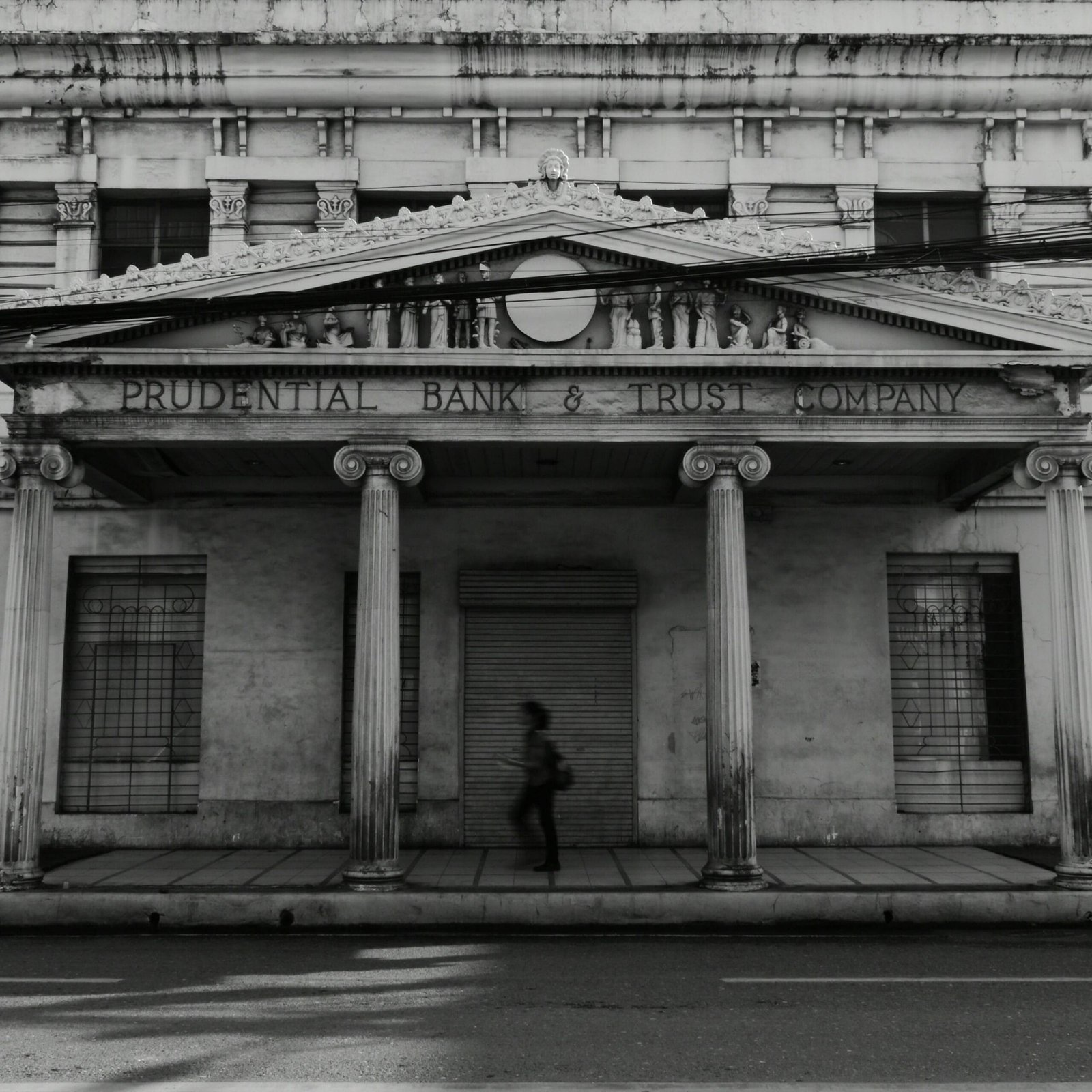 Black and white photo of the old Prudential Bank in Cebu, featuring classic architecture.