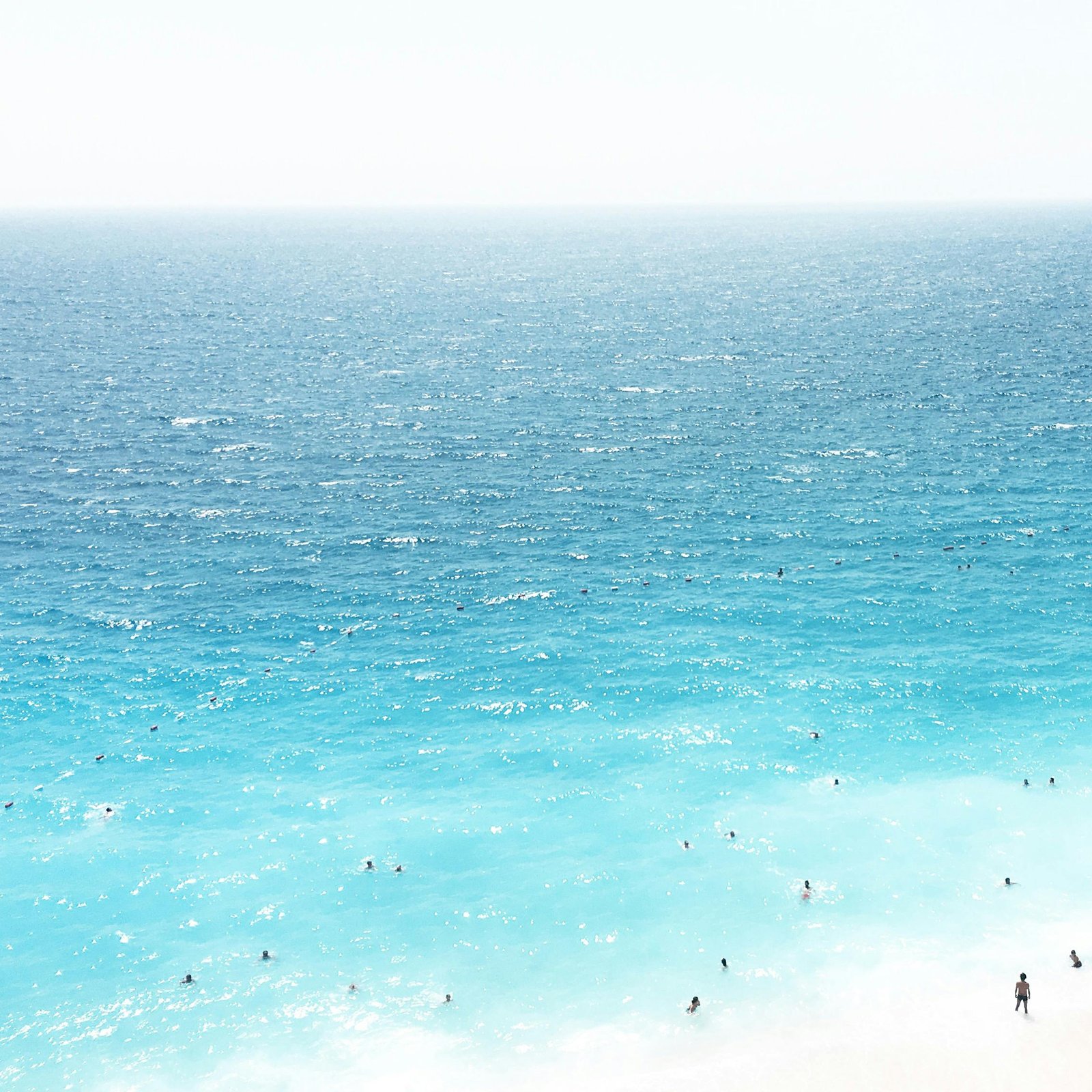 Stunning aerial shot of people enjoying the turquoise waters near Kaş, Turkey.