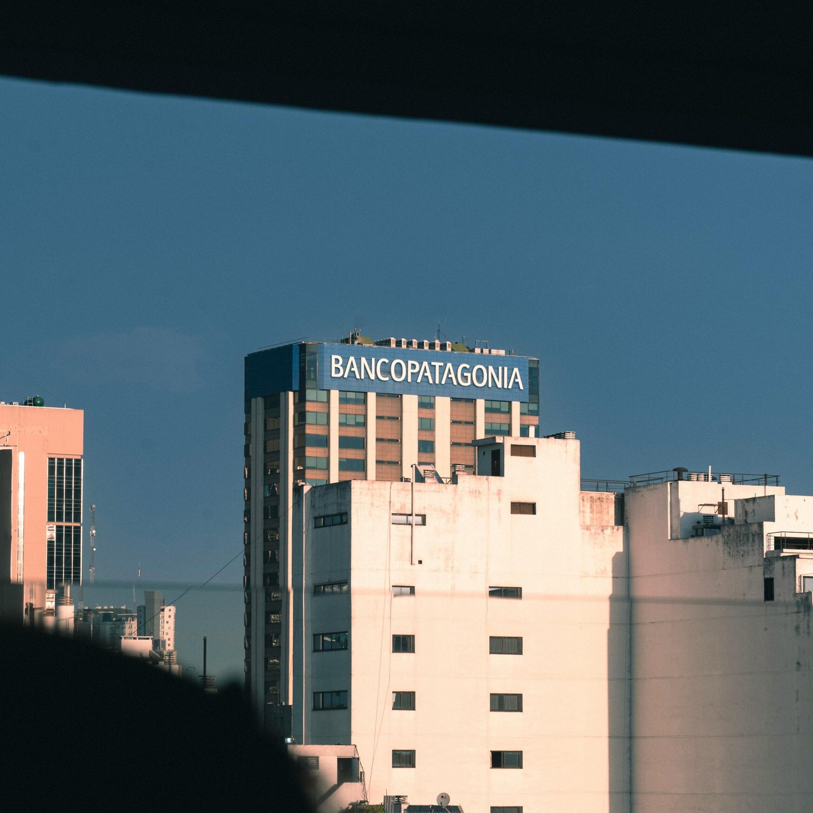 Skyscrapers in Buenos Aires cityscape featuring Banco Patagonia building.