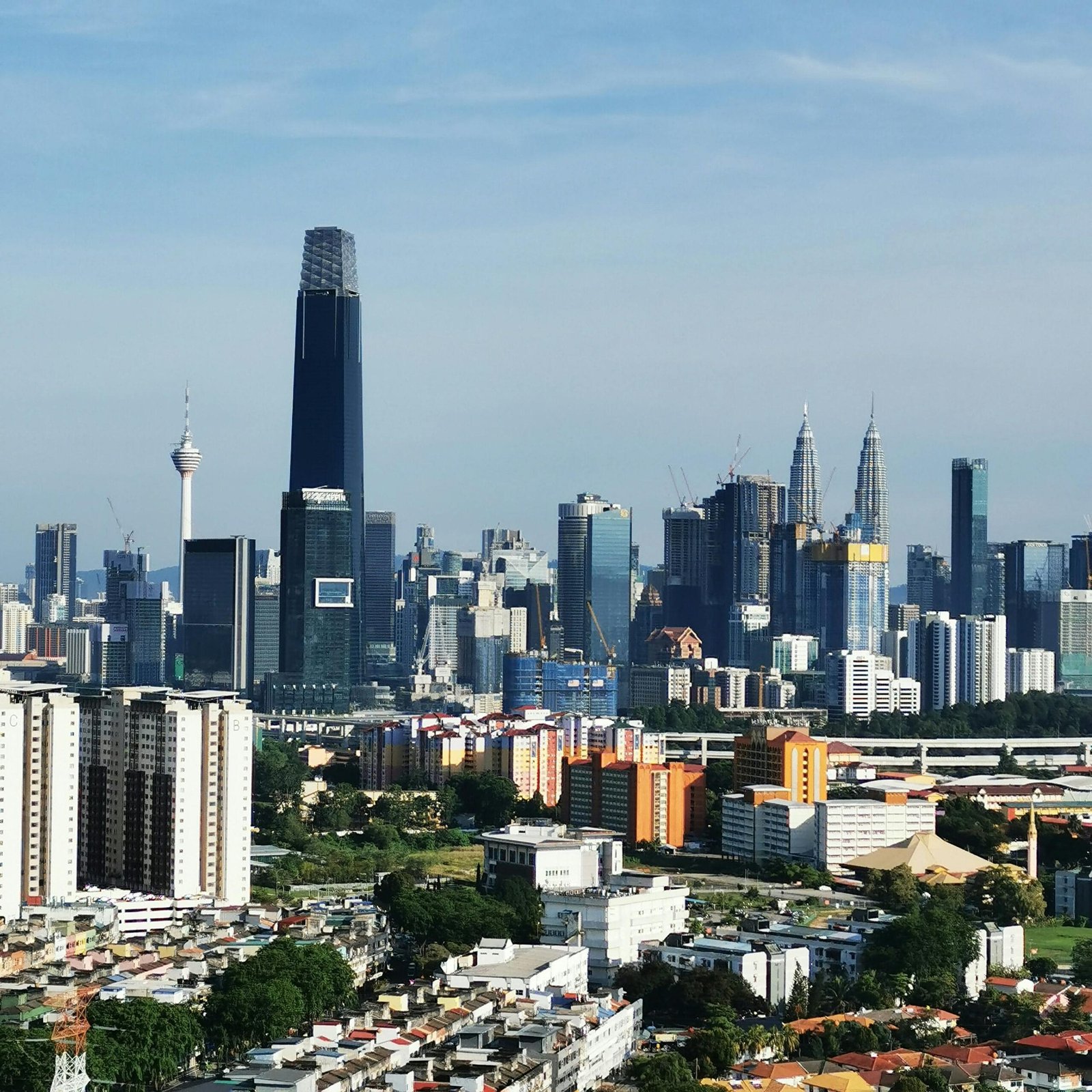Aerial view of Kuala Lumpur skyline, featuring The Exchange 106 and iconic landmarks.