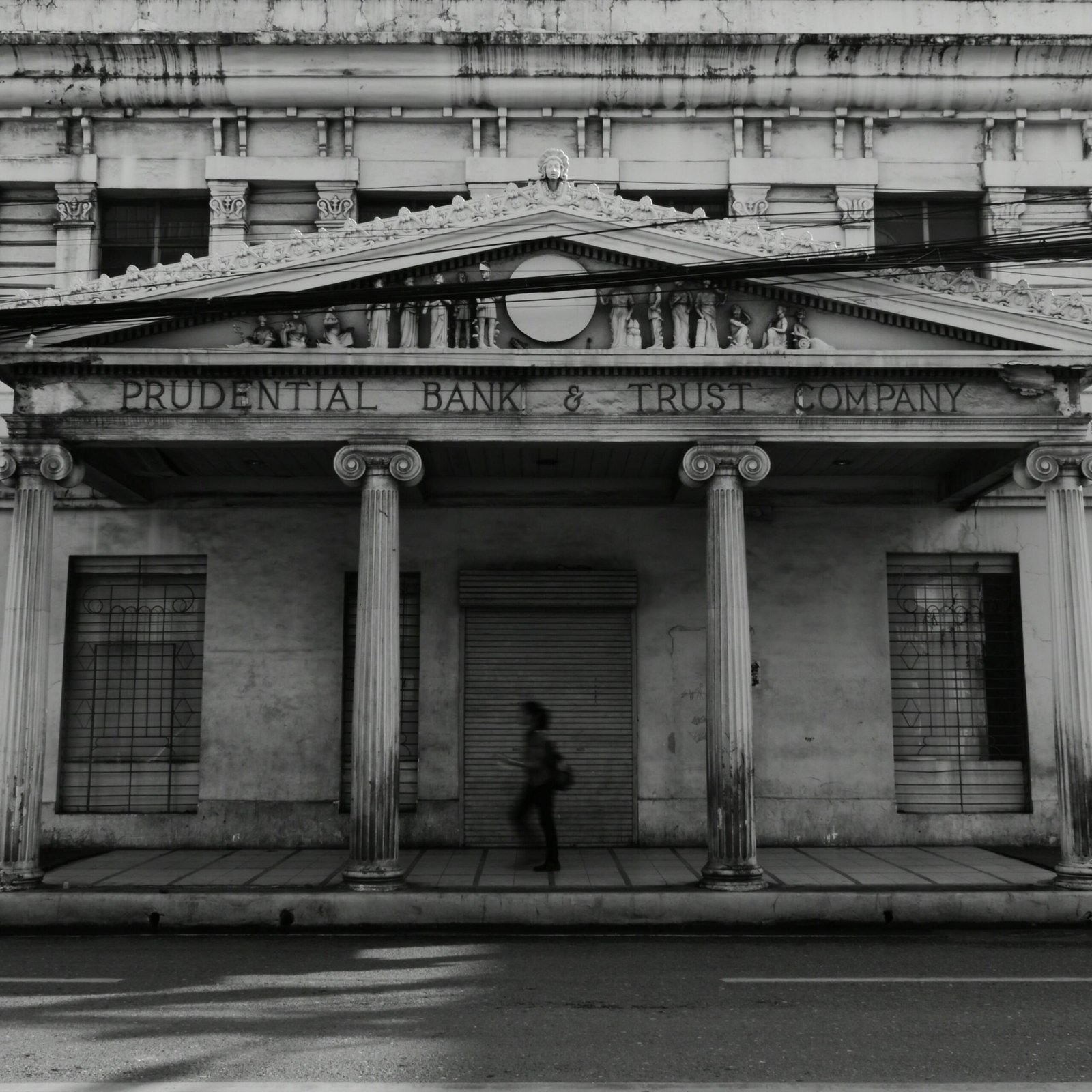 Black and white photo of the old Prudential Bank in Cebu, featuring classic architecture.