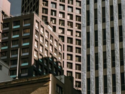 Cluster of high-rise buildings in a bustling urban downtown area