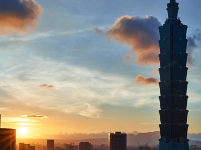 Beautiful sunset view of Taipei 101 towering over the city skyline in Taiwan.