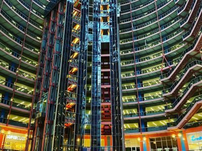 Interior view of a modern atrium showcasing stunning architectural design and office spaces.